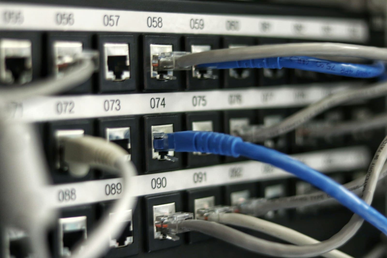 Network cable running through a server rack